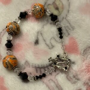 Elegant Black and Orange Beaded Bracelet